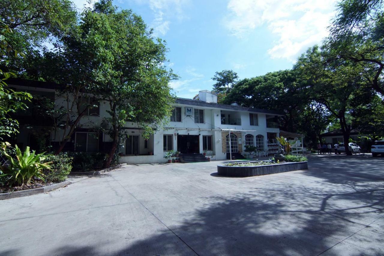 Mint Koregaon Park Next To Osho Ashram Пуна Экстерьер фото